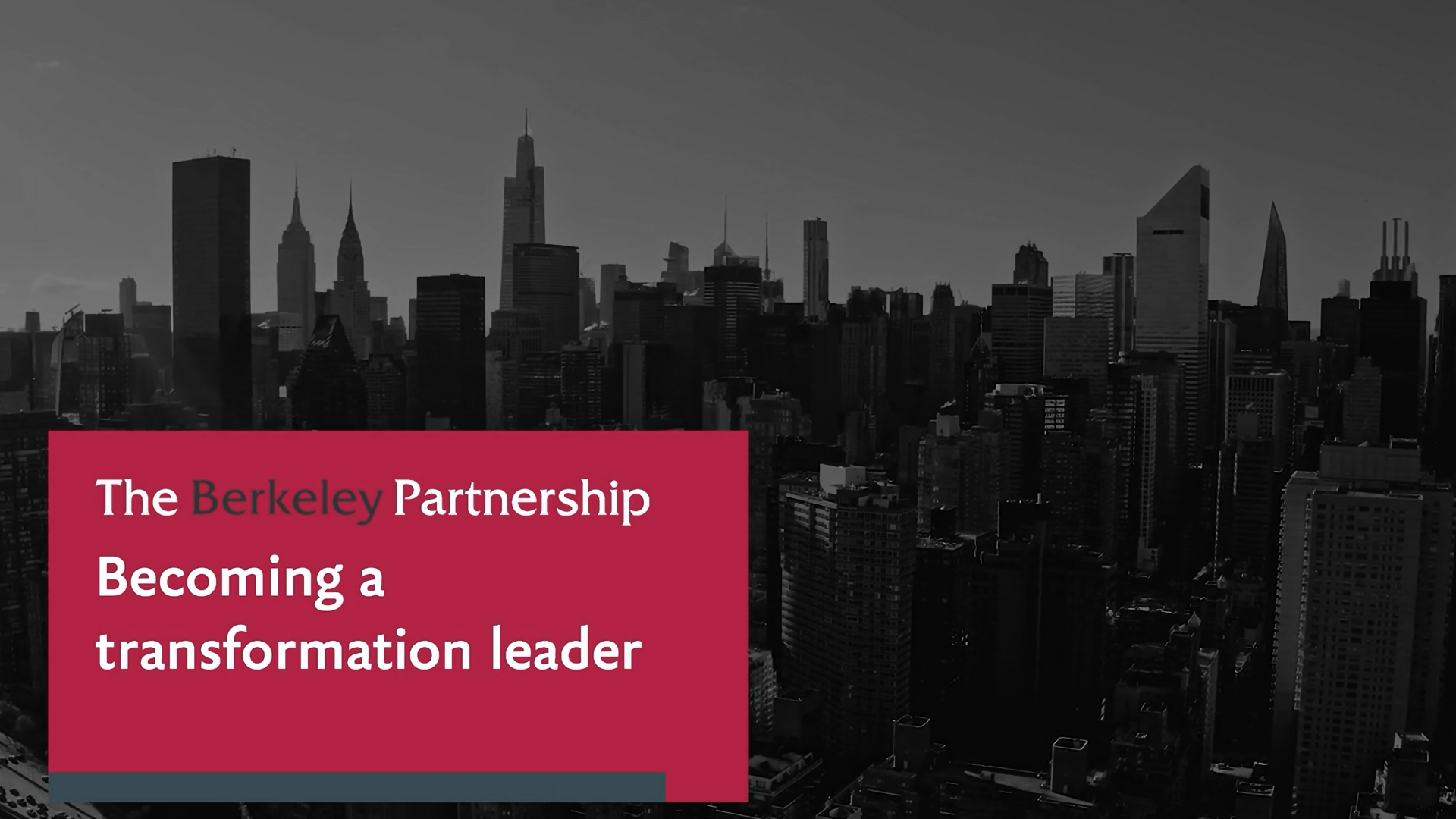 An on-screen banner says, "Becoming a transformation leader." A grayscale image of a New York City skyline is in the background.